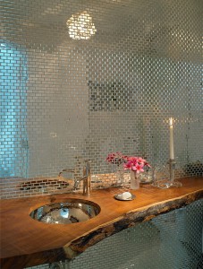 Custom-tile-backdrop-and-wooden-counter-in-the-powder-room