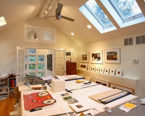 Home-office-with-extra-large-work-bench-for-artist-and-skylights