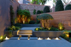 Small-outdoor-space-with-an-illuminated-water-feature