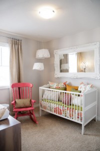 white-nursery-room-with-eye-cathing-chair