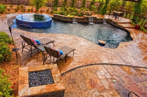 Pool-deck-in-stamped-concrete-with-slate-skin-pattern-looks-amazing