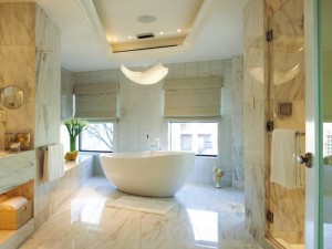 Bathrooms-Chic-small-bathroom-with-incredible-big-white-ceramic-soaking-tub-and-beautiful-white-marble-floor-tiles-also-curve-crystal-pendant-lamp-comfortable-Small-Bathrooms-agree-718x539
